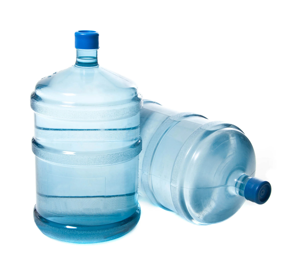 Large water jugs with blue caps for office or home water delivery service
